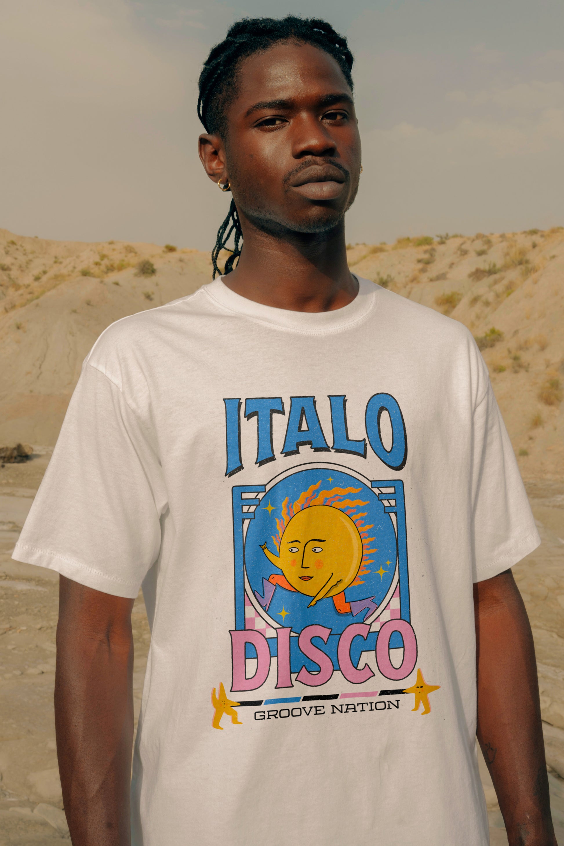 Male Model wearing McIndoe Design's Italo Disco graphic t-shirt in white cotton, close-up detail of disco print